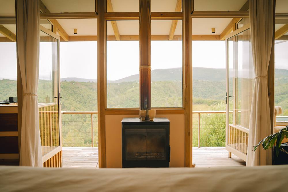 Fireplace with the doors open to the valley