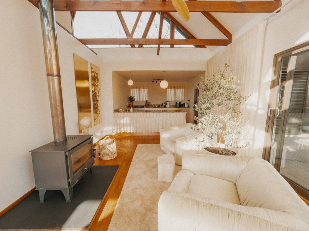 Living room with the fireplace lit