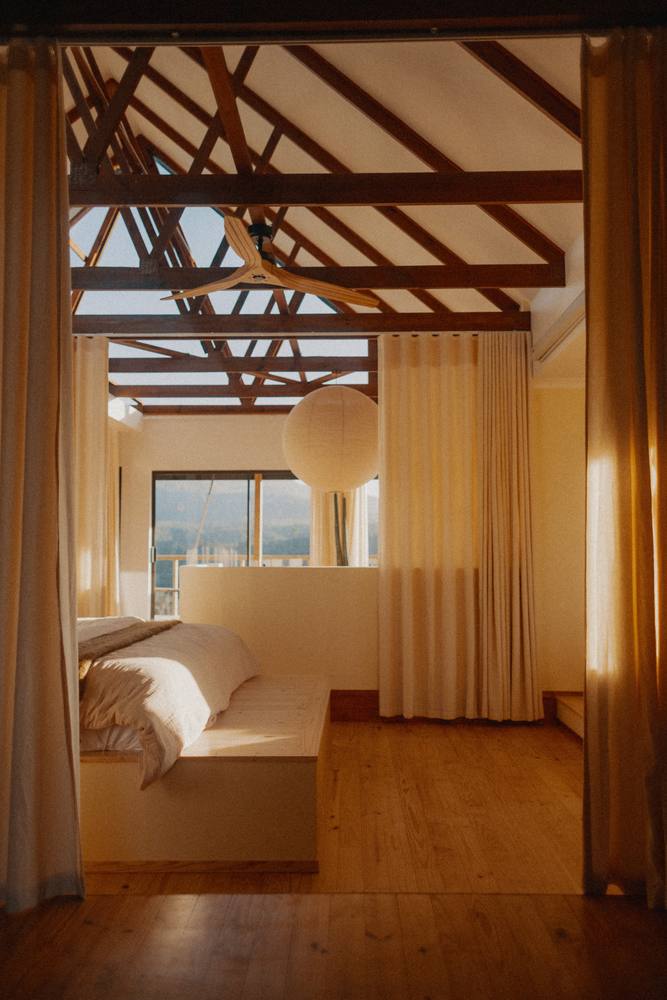 Bed beneath the pitched roof